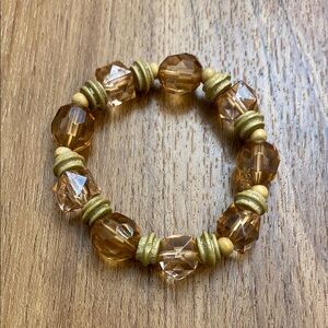 Luxurious Gold and Brown Beaded Bracelet with Unique Spacers